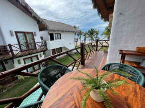 Ap Vila Mar Pé na areia com vista para o mar e piscina